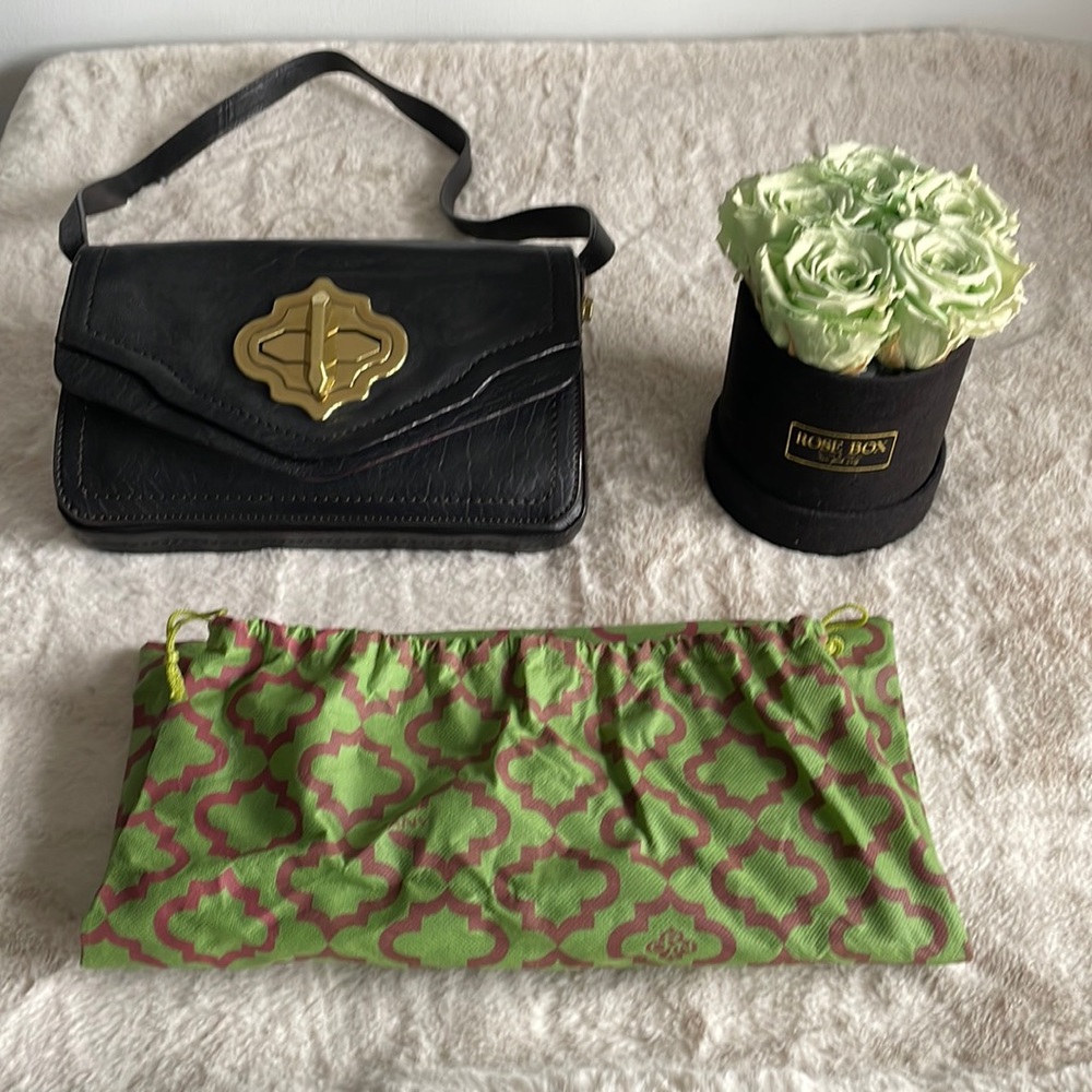 NWOT OrYanny Black Leather Handbag with Turn-lock closure. 10 L x 4 W x 6.5 H